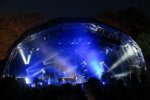 Tom Odell plays piano on the Larmer Tree stage