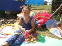 girl doing crafts at Cornbury